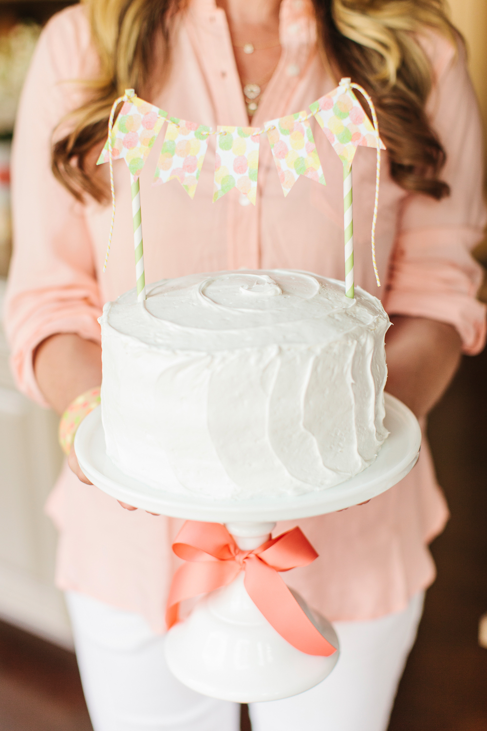 simple white cake with bunting