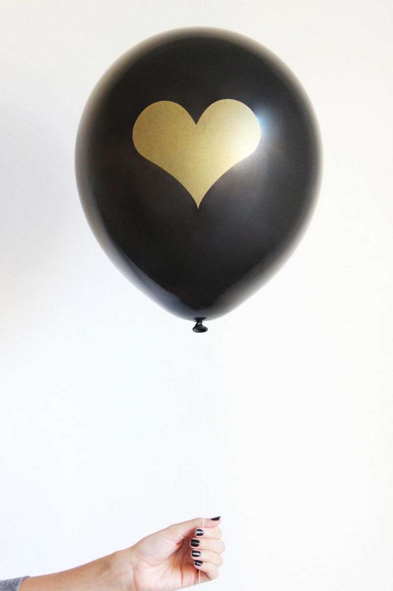 black and gold heart balloon