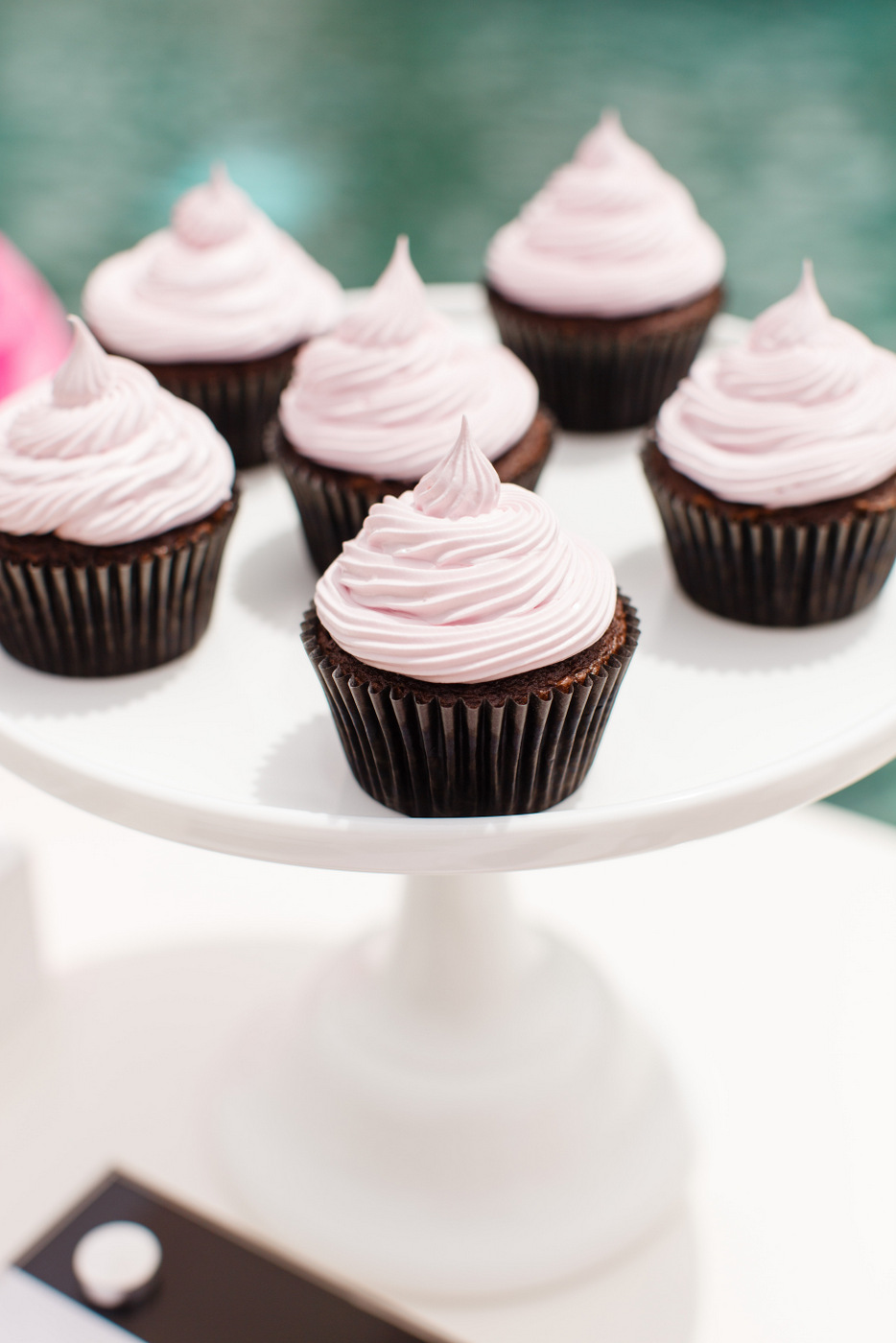 chocolate cupcakes with pink frosting - tomkat studio