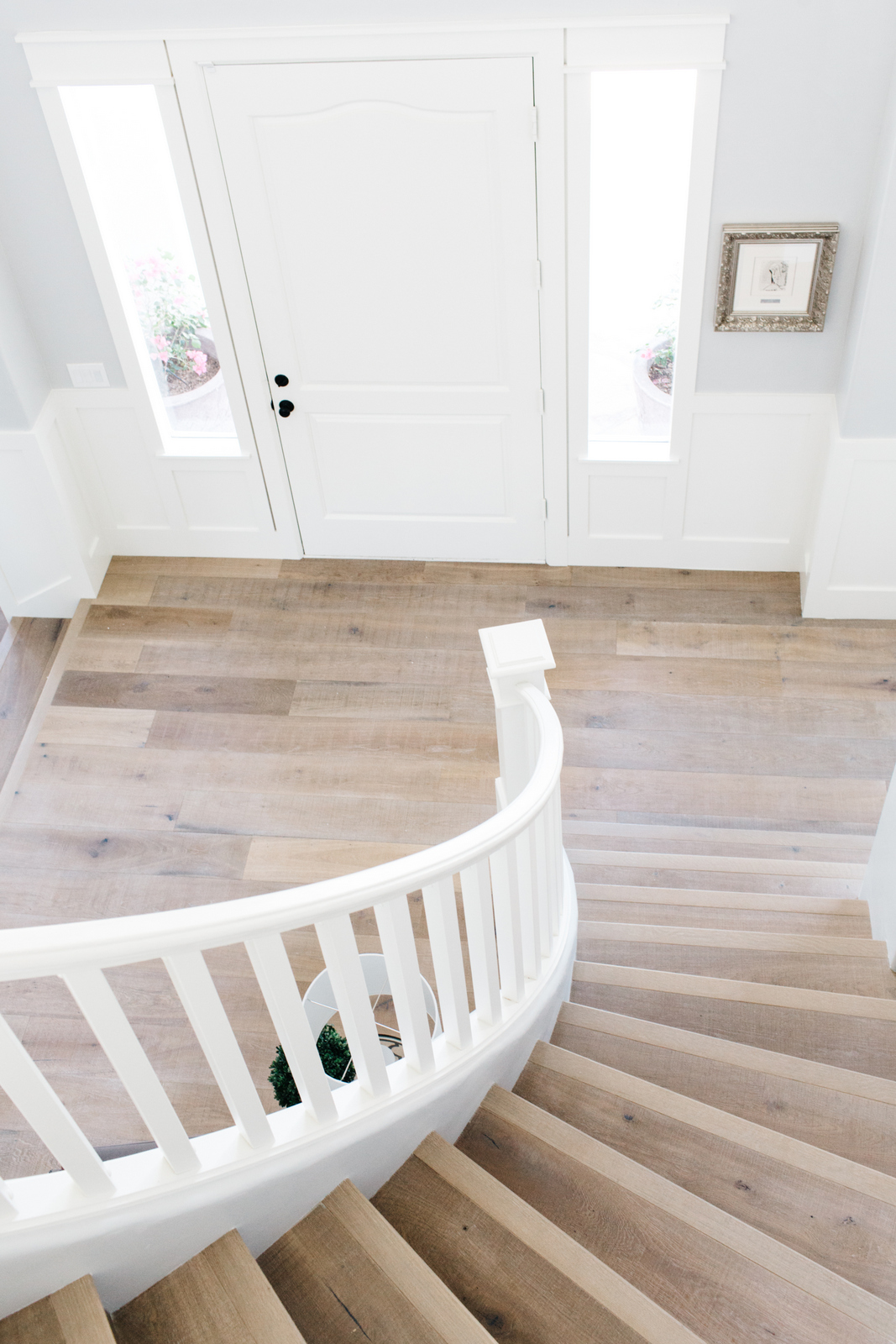 wood stairs with white wood railing