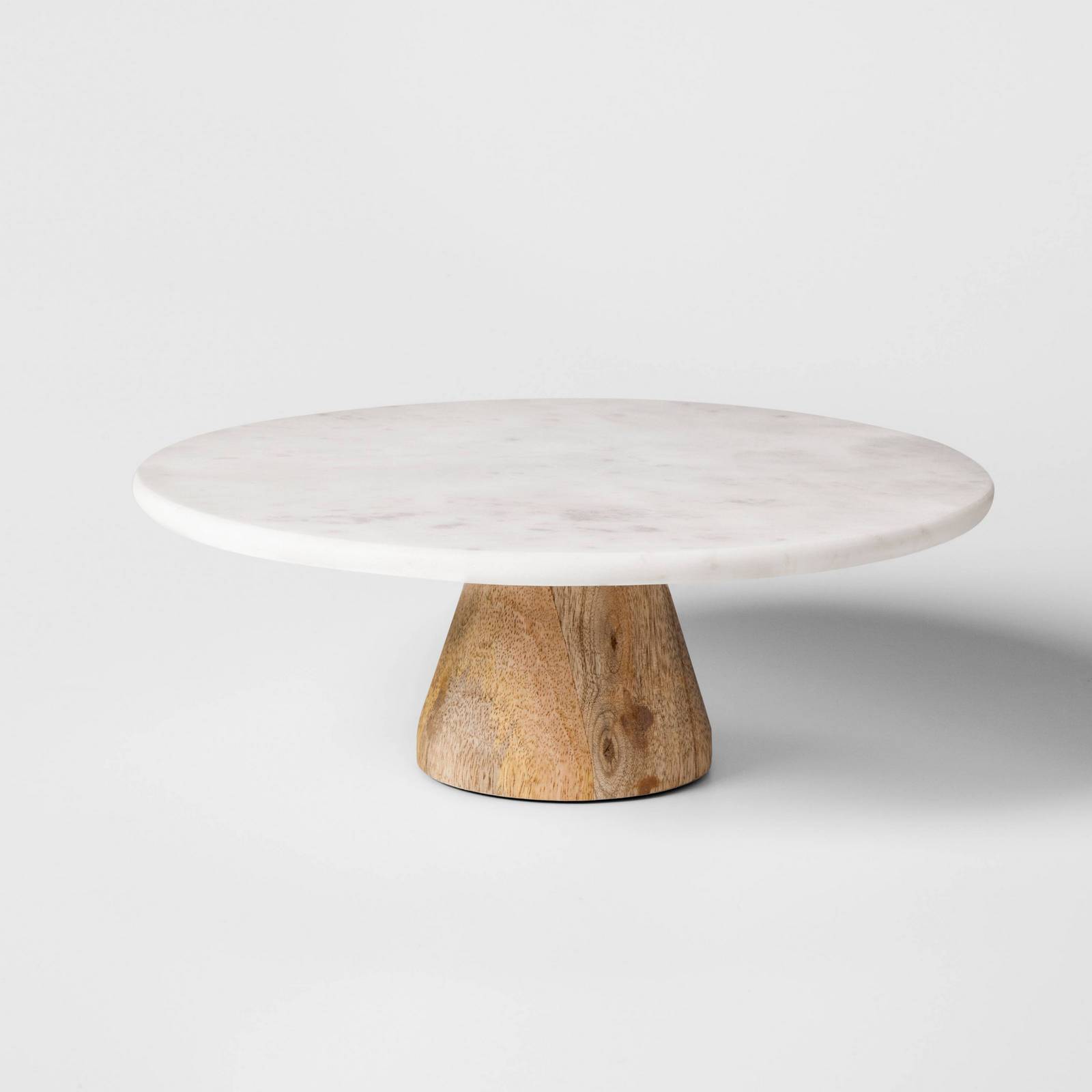 wood and marble cake stand